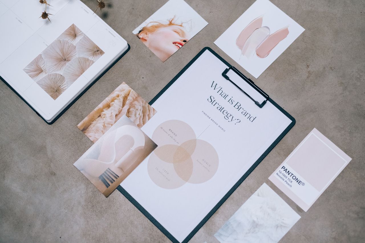 Flat lay of branding materials and design concepts used for creative strategy conversations.